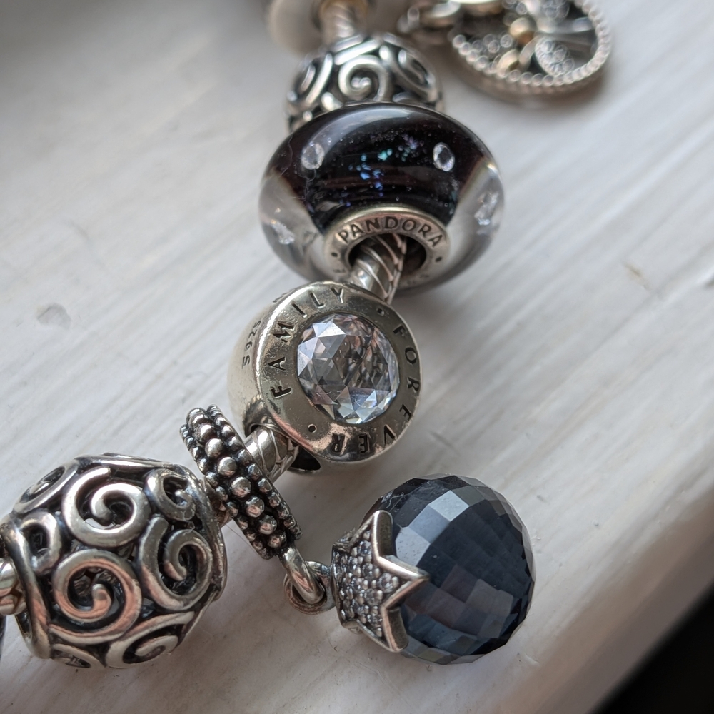 Pandora Bracelet with Charms: Blue Glass and Silver Floral Accents - Picture 4 of 7
